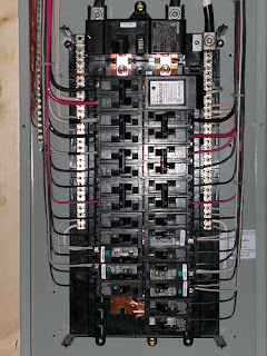 electrician in Windsor, Ontario replaces old panels, service conduits, and stack pipes 226 783 4016