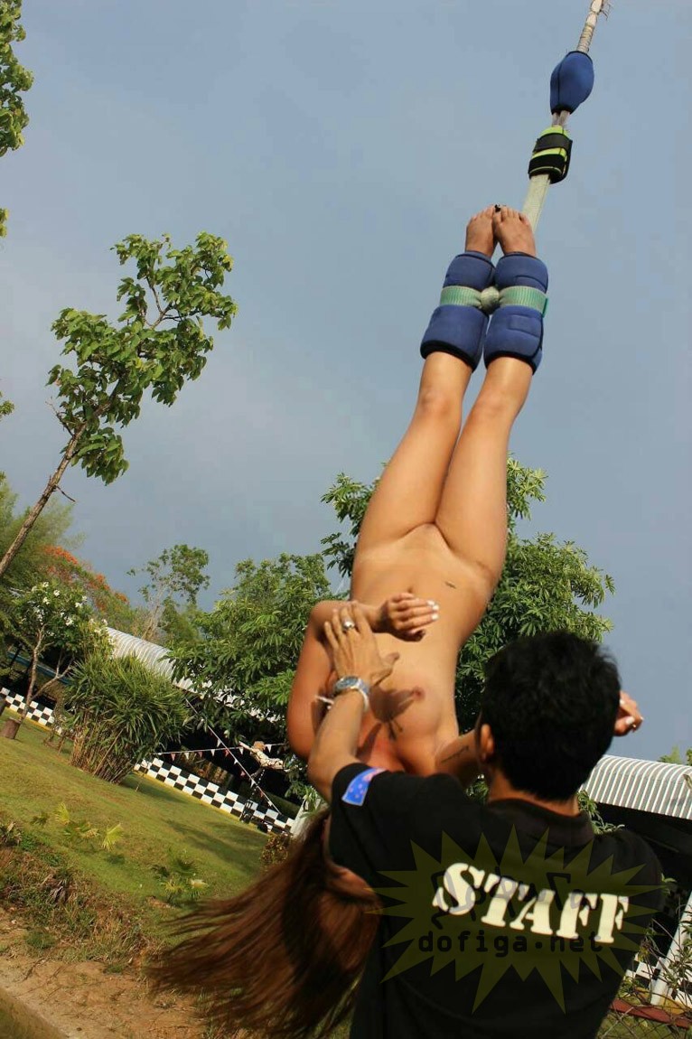 Naked asian bungee jumping
