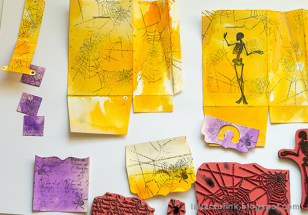 Layers of ink - Waterfall Video Tutorial by Anna-Karin Evaldsson, stamping papers with Halloween stamps.