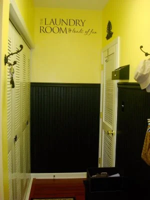 Black and yellow laundry room