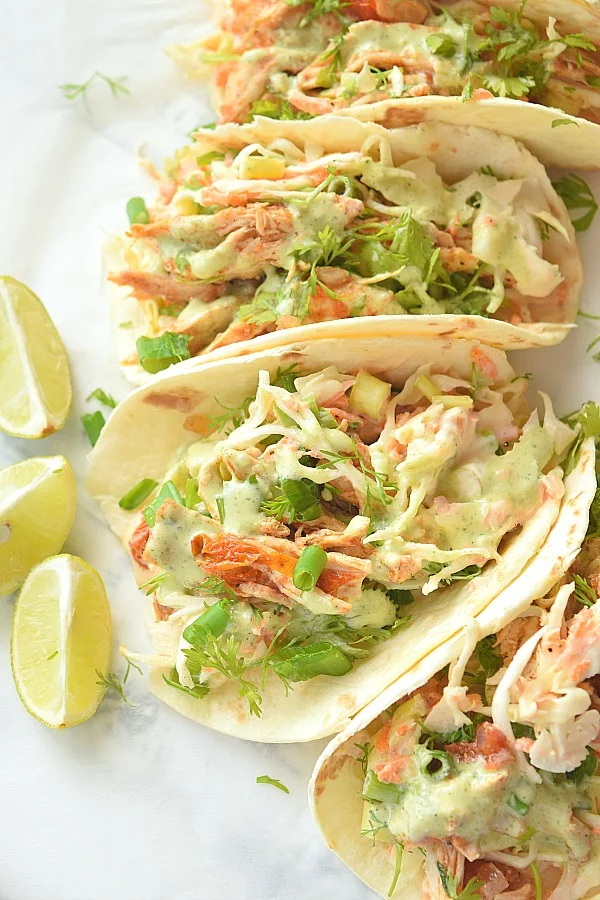 Tacos with grilled chicken,slaw and creamy cilantro lime sauce