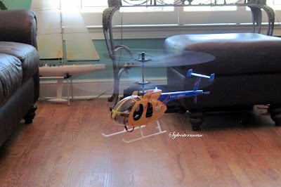 flying a remote control helicopter