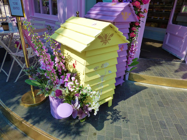 Floral display outside Peggy Porschen cafe in London, for free flower festival Belgravia in Bloom 2018 Floral display outside Peggy Porschen cafe in London, for free flower festival Belgravia in Bloom 2018