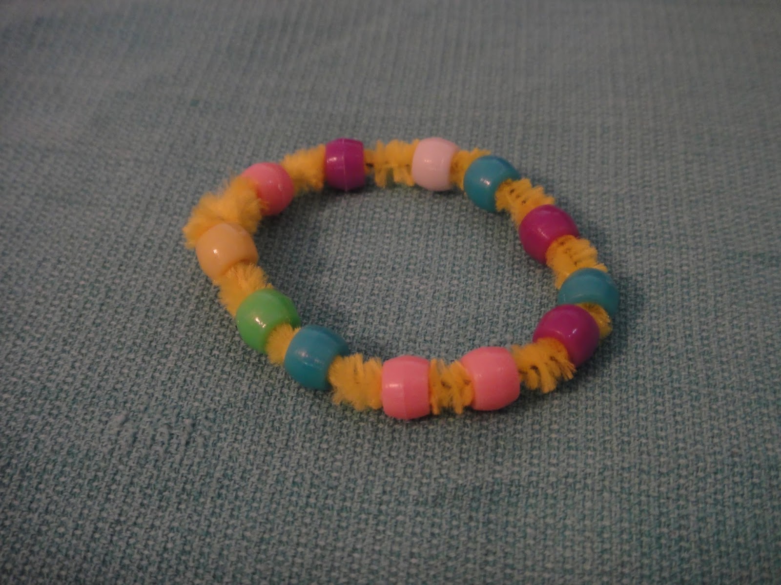 The Inspired Toddler Toddler Bracelet Making