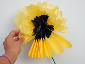 Pull apart tissue paper to create lovely two color tissue paper flowers