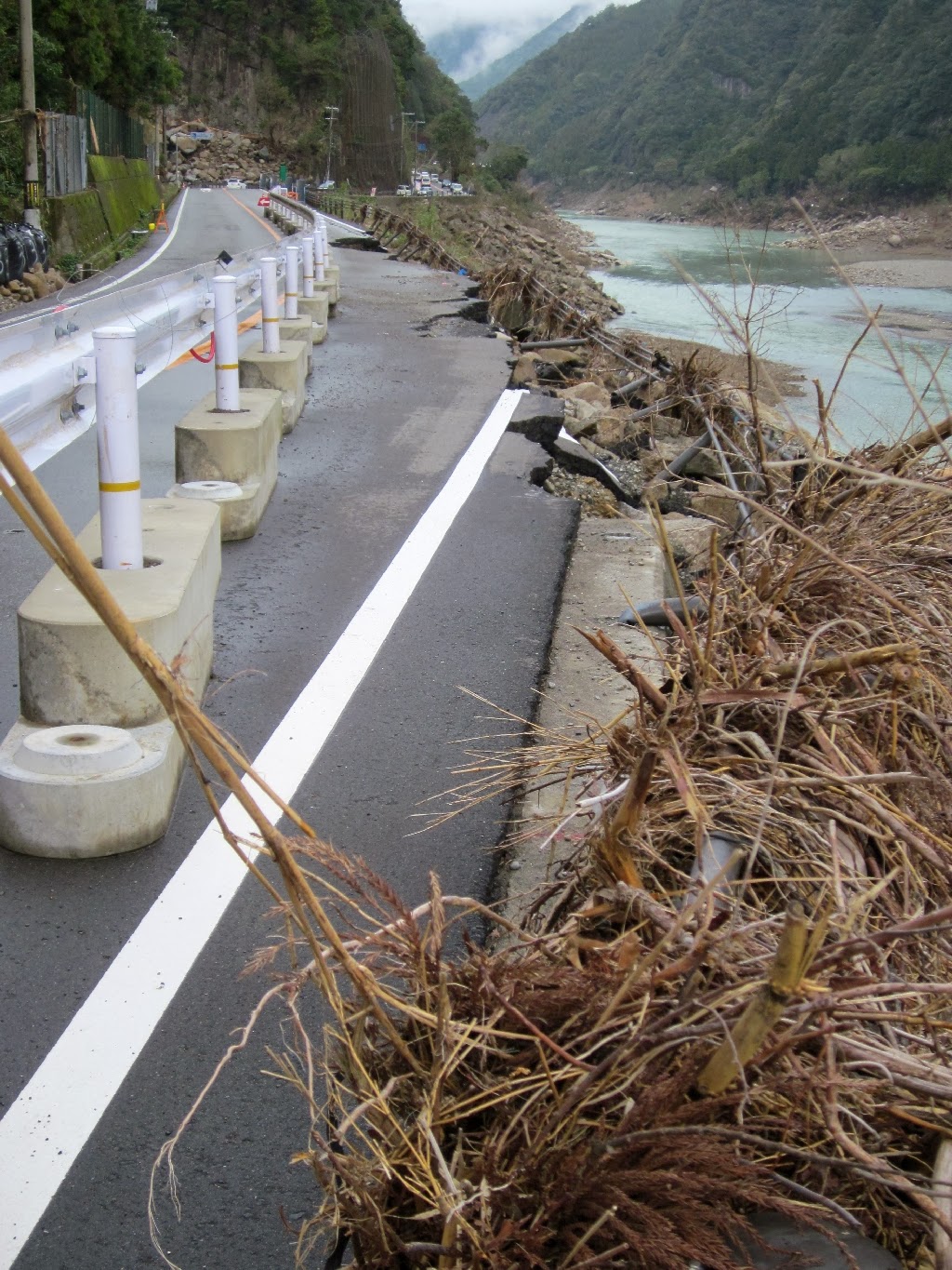 Typical road section three months after the typhoon Typical road section three months after the typhoon