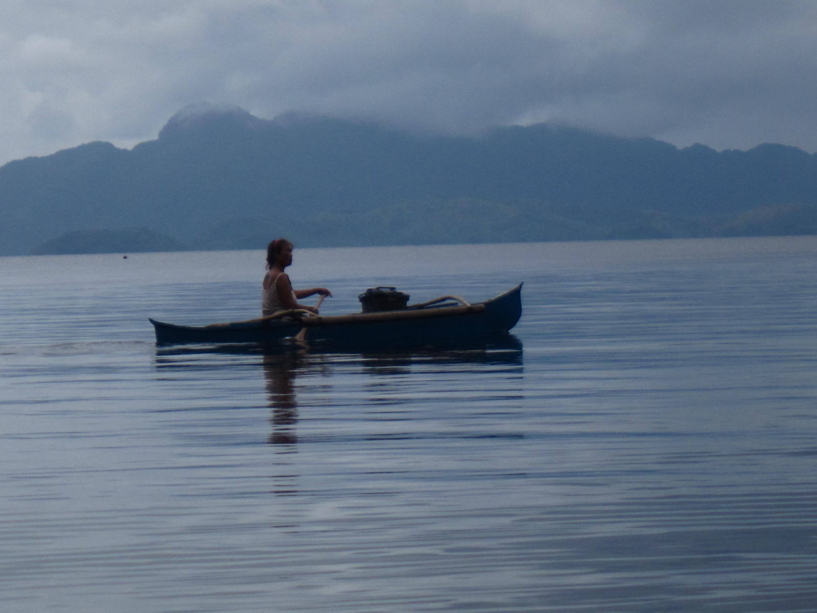 Live in the Moment A woman in a canoe