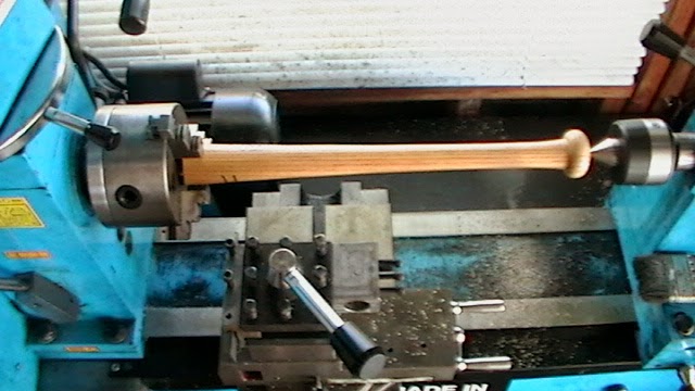 Baseball bat handle in the lathe, first opperation.