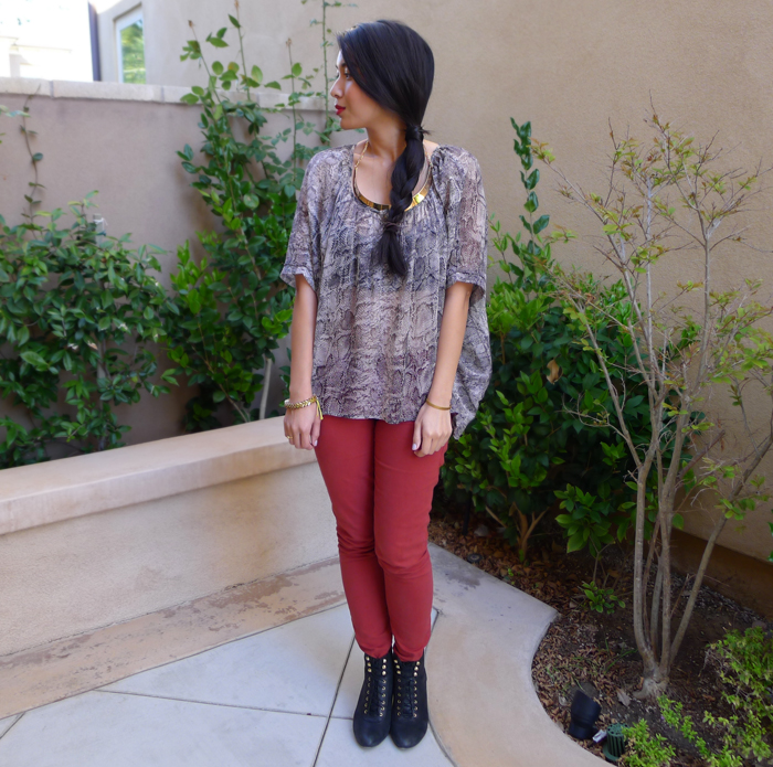 snake print top and red pants
