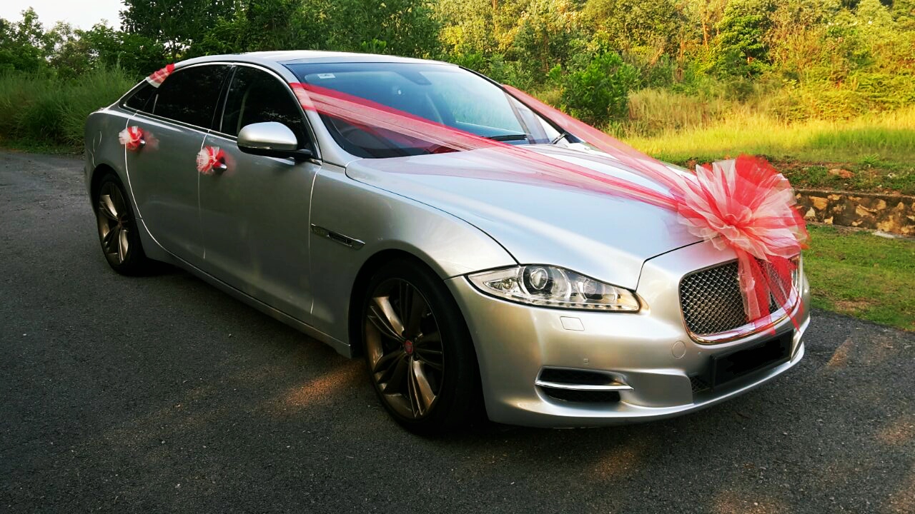 RedOrca Malaysia Wedding and Event Car Rental Jaguar XJL with red