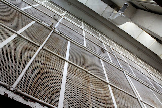 4 floors of fenced hallways in prison