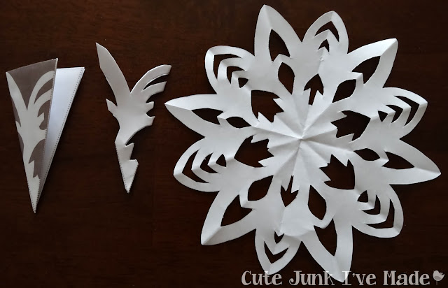 Paper Snowflake Curtain Tutorial - Template 4 folded, cut out and final product