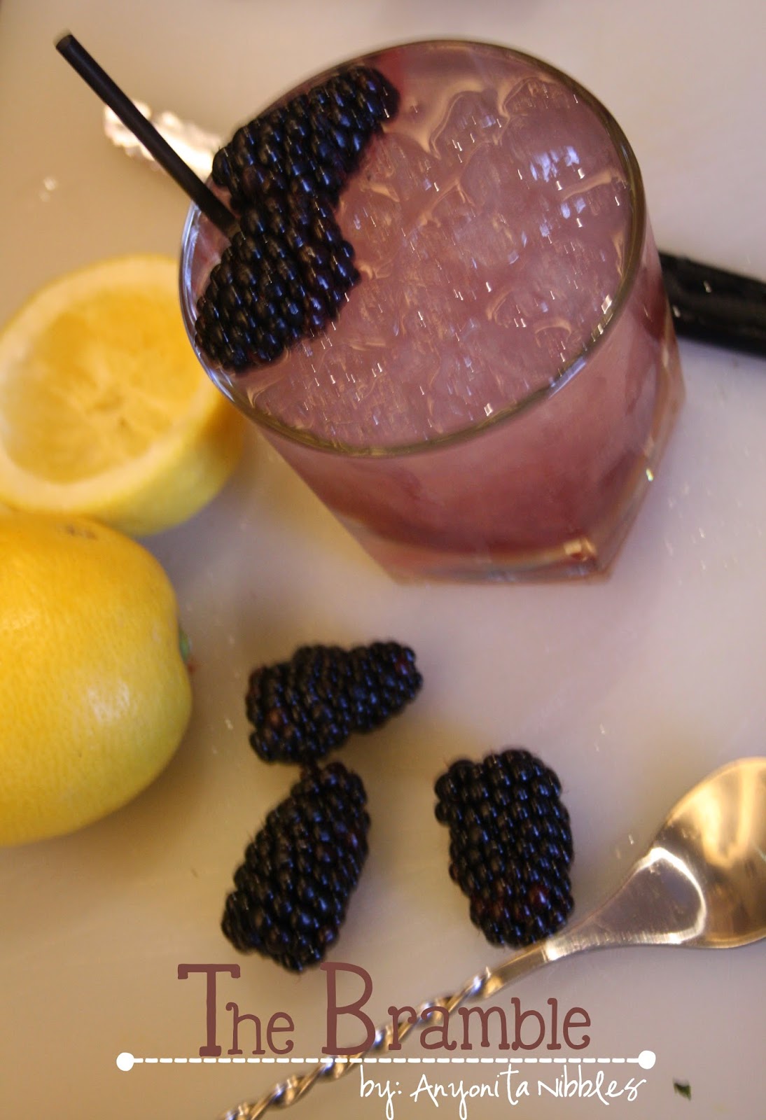 A glass of Bramble made with gin and blackberry liqueur from Anyonita Nibbles