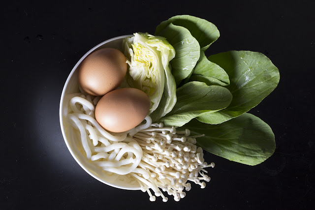 Food Photography: Dish Top View Photograph of a dish from top view filled with egg, kailan, cabbage, enokitake and noodle