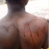 See the way a Buhari supporter brand APC into his skin to celebrate APC's Victory(PHOTO)