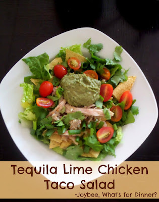 Tequila Lime Chicken Taco Salad:  Left over rotisserie chicken,  shredded,  marinated in tequila and lime juice topping green lettuce and tortilla chips.