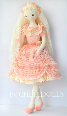 Crochet amigurumi doll in beautiful dress