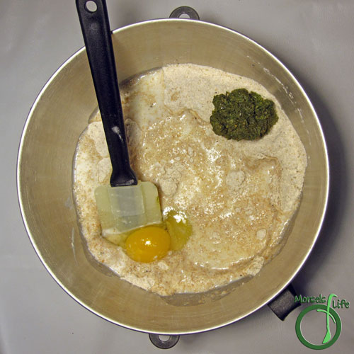 Morsels of Life - Mediterranean Scones Step 3 - Stir in egg, milk, and pesto.