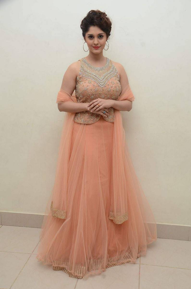 Surabhi Hot Photos In Pink Dress At Audio Launch