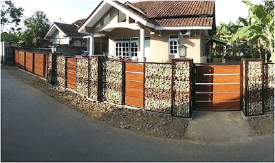 desain pagar batu alam oranye