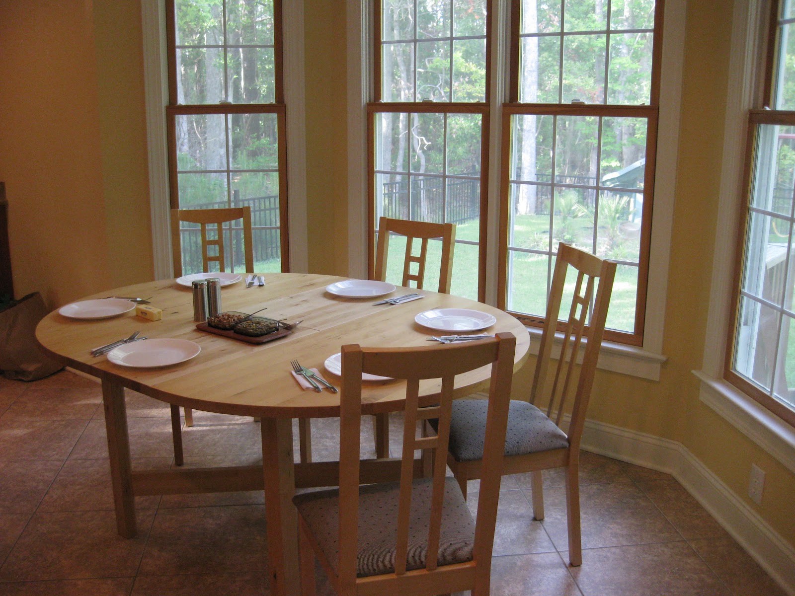Ikea black dining room set. finish modern table w optional side ...