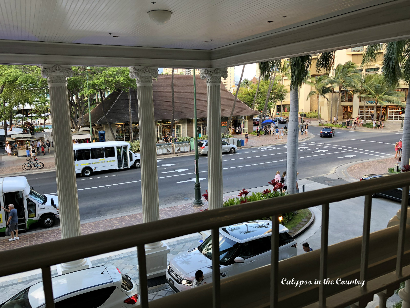 Hotel balcony overlooking valet and the streets of Waikiki