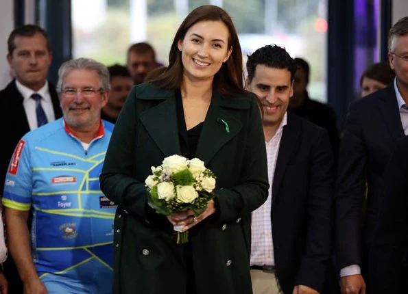 Princess Claire of Luxembourg attended the 11th Indoor Cycling Marathon. Princess Claire wore a green wool coat by Alexander McQueen