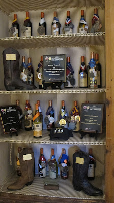 wall of award wining wines from Brennan Vineyards
