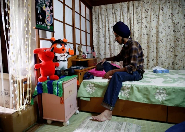 Image Attribute: Gursewak Singh sits on a bed in a room of his house during an interview with Reuters, in Matsudo, Japan, September 25, 2016. REUTERS/Kim Kyung-Hoon