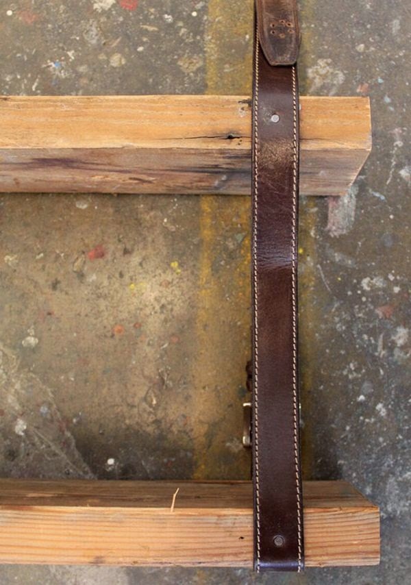 Wooden shelf and recycled belts
