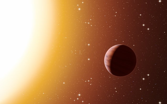 This artist’s impression shows a hot Jupiter planet orbiting close to one of the stars in the rich old star cluster Messier 67, in the constellation of Cancer (The Crab).