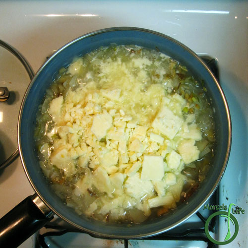 Morsels of Life - Cheesy Potato Soup Step 3 - Melt in cheese.