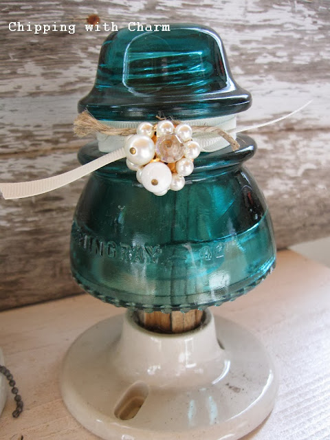 Chipping with Charm: Glass Insulator Christmas Tree...http://www.chippingwithcharm.blogspot.com/