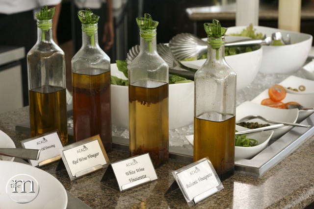 Vinegar and Oil-Based Salad Dressings with different kinds of greens