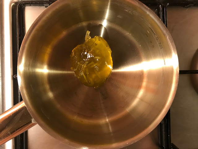 Lime marmalade being melted in a pan