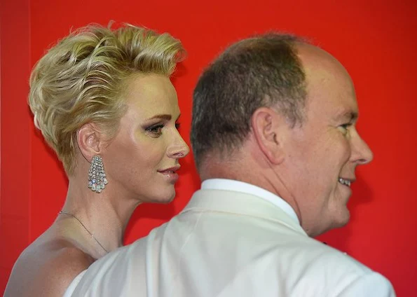 Prince Albert and Princess Charlene attended the 68th annual Monaco Red Cross Gala, Charlene wore Velentino Gown dress, Cartier Diamond Earrings