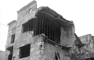 houses gutted by mortars in Mostar