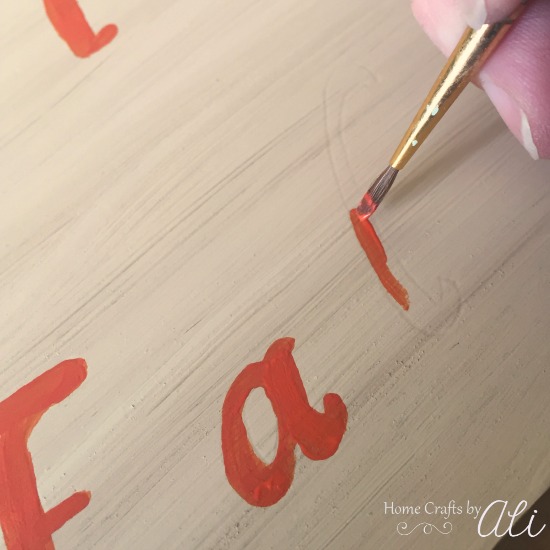 Carefully Paint Letters with Fine Tip Paintbrush