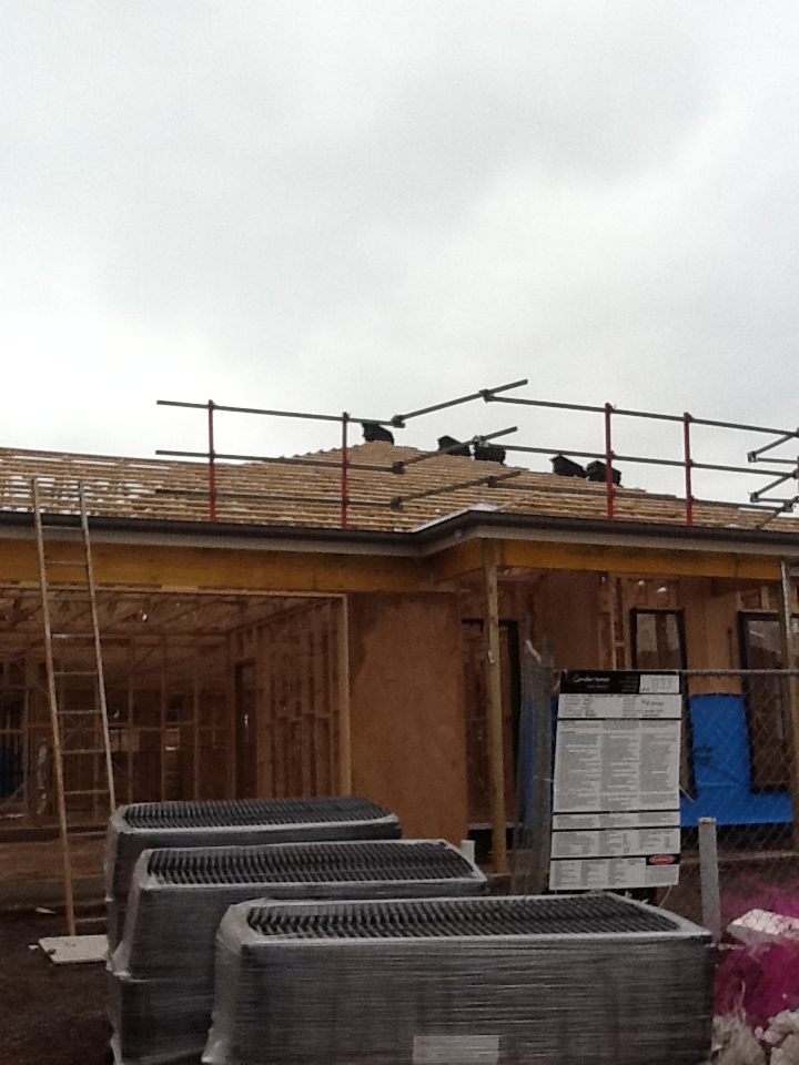 Any Day Now Tiles delivered, and roofing begins