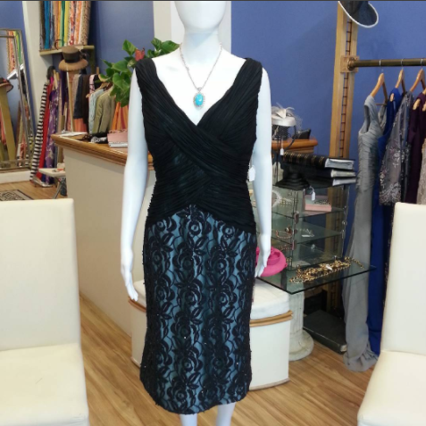 Dress on sale $250. Black chiffon rouged bodice. Lace skirt in black lined with a turquoise lining. For any occasion.