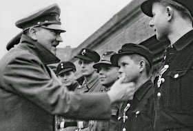 Hitler with Hitler youth boys