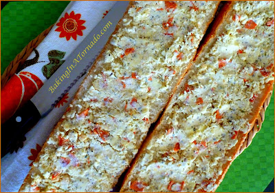 Loaded Garlic Bread, an Italian loaf packed with flavor for a delicious accent to any meal | Recipe developed by www.BakingInATornado.com | #recipe #bread