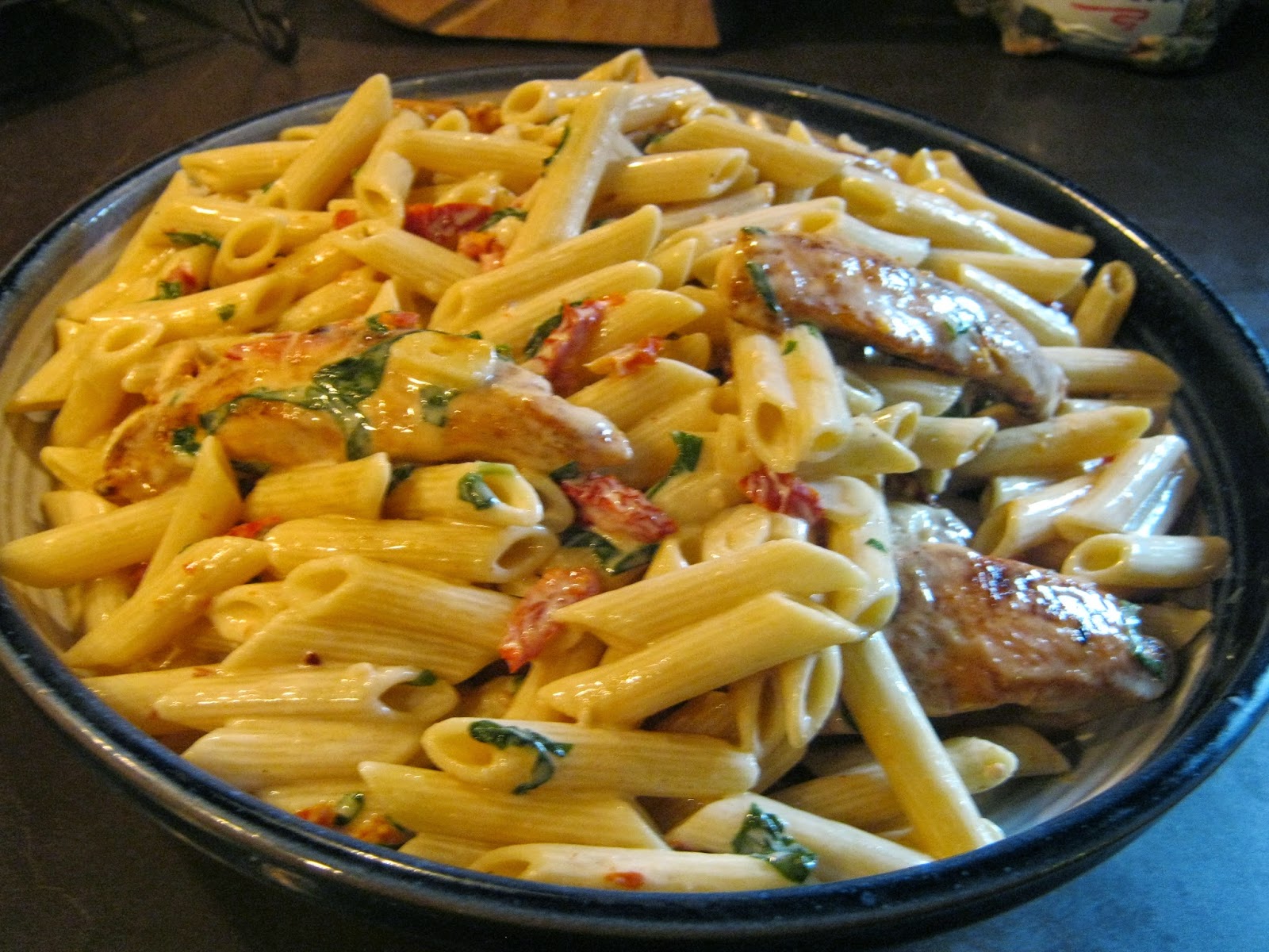 Let the Feasty Begin Creamy Penne with Chicken and Sun Dried Tomatoes