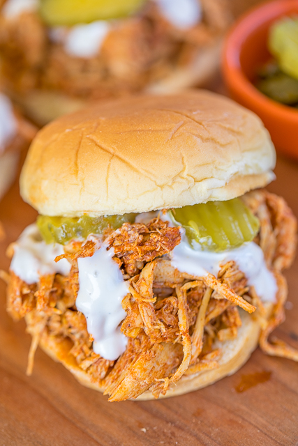 Slow Cooker Nashville Hot Chicken - adapted from the original Hattie B's Hot Chicken recipe in Nashville, TN. SO good!! Chicken, cayenne, brown sugar, garlic powder, paprika, chili powder, butter and chicken broth. Serve the chicken on slider buns with ranch and pickles. SO good! Sweet and spicy in every bite - YUM! #slowcooker #nashvillehotchicken #chickenrecipe #hotchicken Slow Cooker Nashville Hot Chicken - adapted from the original Hattie B's Hot Chicken recipe in Nashville, TN. SO good!! Chicken, cayenne, brown sugar, garlic powder, paprika, chili powder, butter and chicken broth. Serve the chicken on slider buns with ranch and pickles. SO good! Sweet and spicy in every bite - YUM! #slowcooker #nashvillehotchicken #chickenrecipe #hotchicken