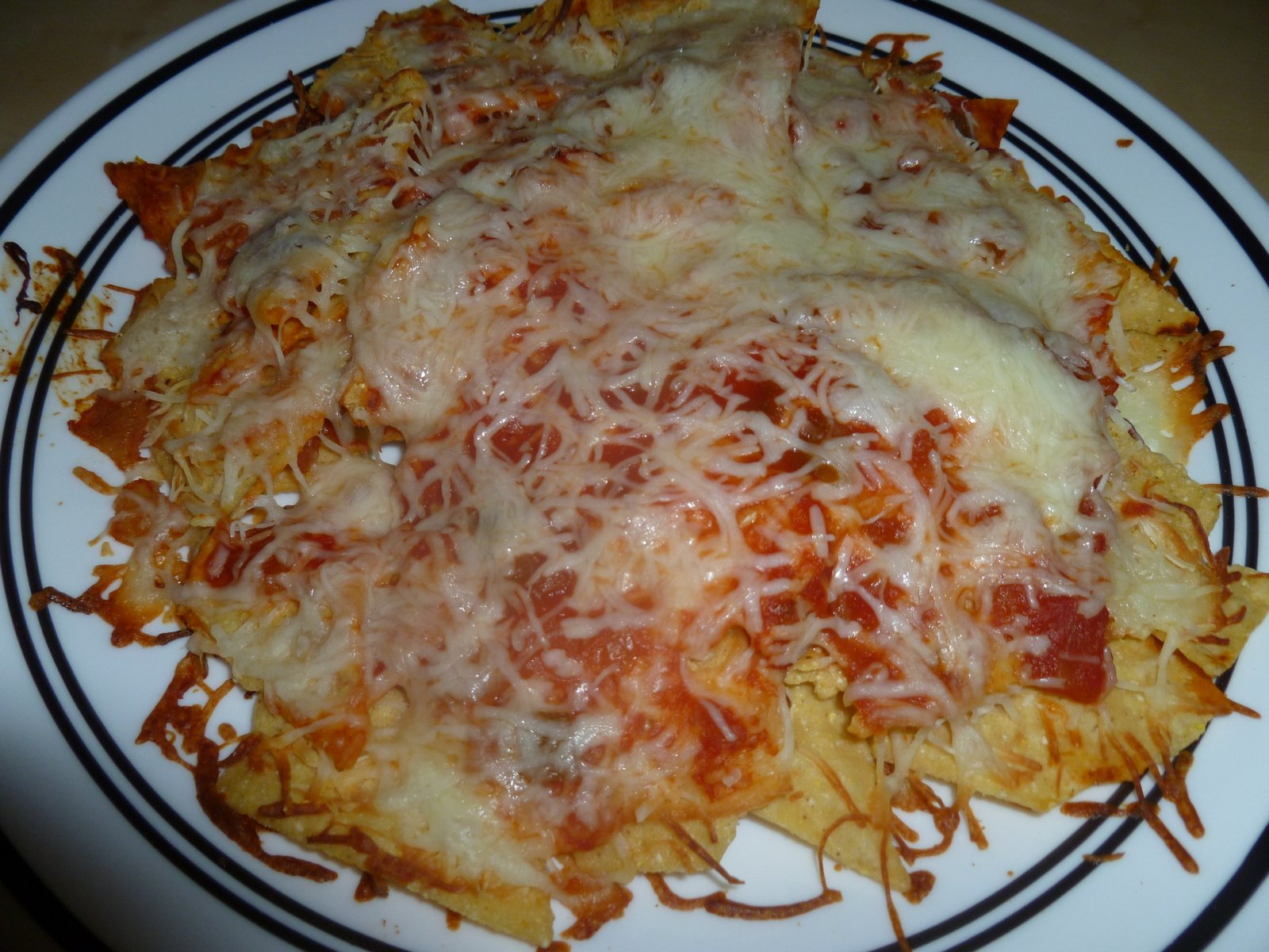 TORTILLA CHIPS WITH MELTED CHEESE AND SALSAHAPPY 5 DE MAYO