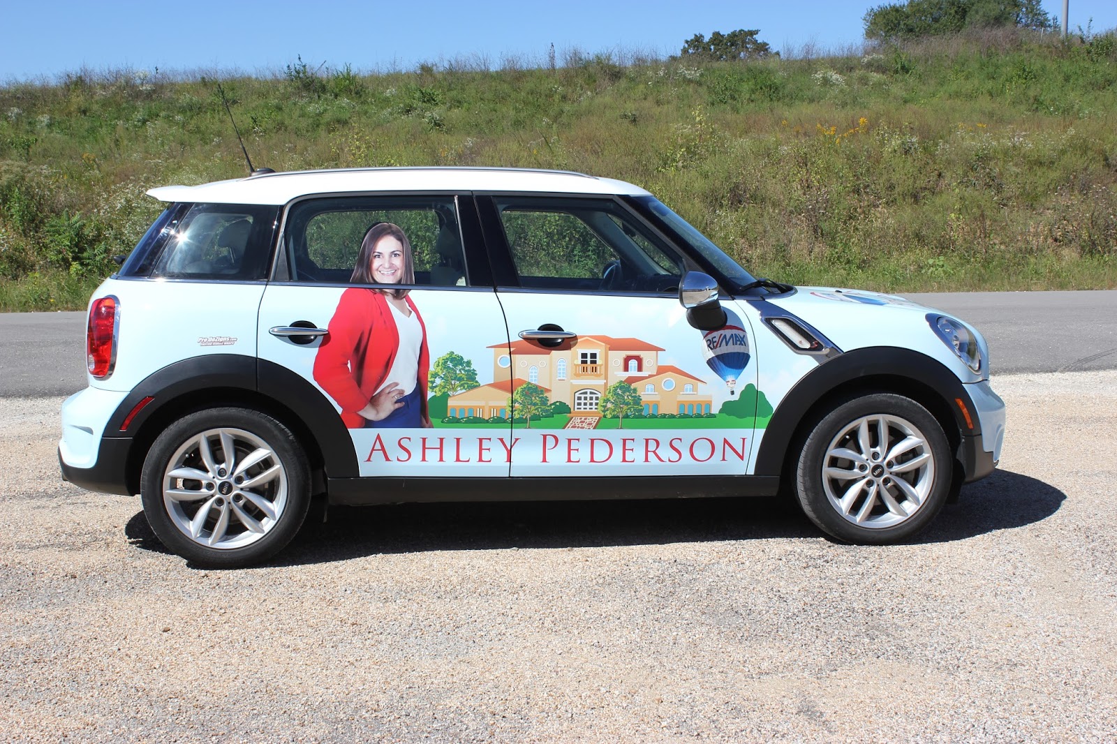 Pro DeZigns LLC Propel Your Real Estate Business with Vehicle Wrap