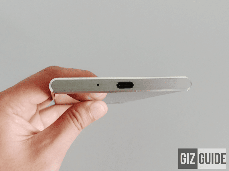 Another microphone and USB Type C slot below