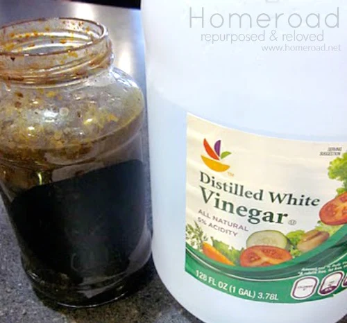 Vinegar and a jar of brown liquid