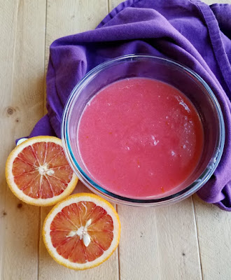 If you like lemon curd, you are going to love this blood orange curd! It has that citrusy tang and sweet and sumptuous texture. Plus it comes together in just a few minutes with very little effort. You can spread it on toast or muffins, swirl it into yogurt or fill your cakes with homemade goodness! bowl of pink orange curd with blood orange halves nearby