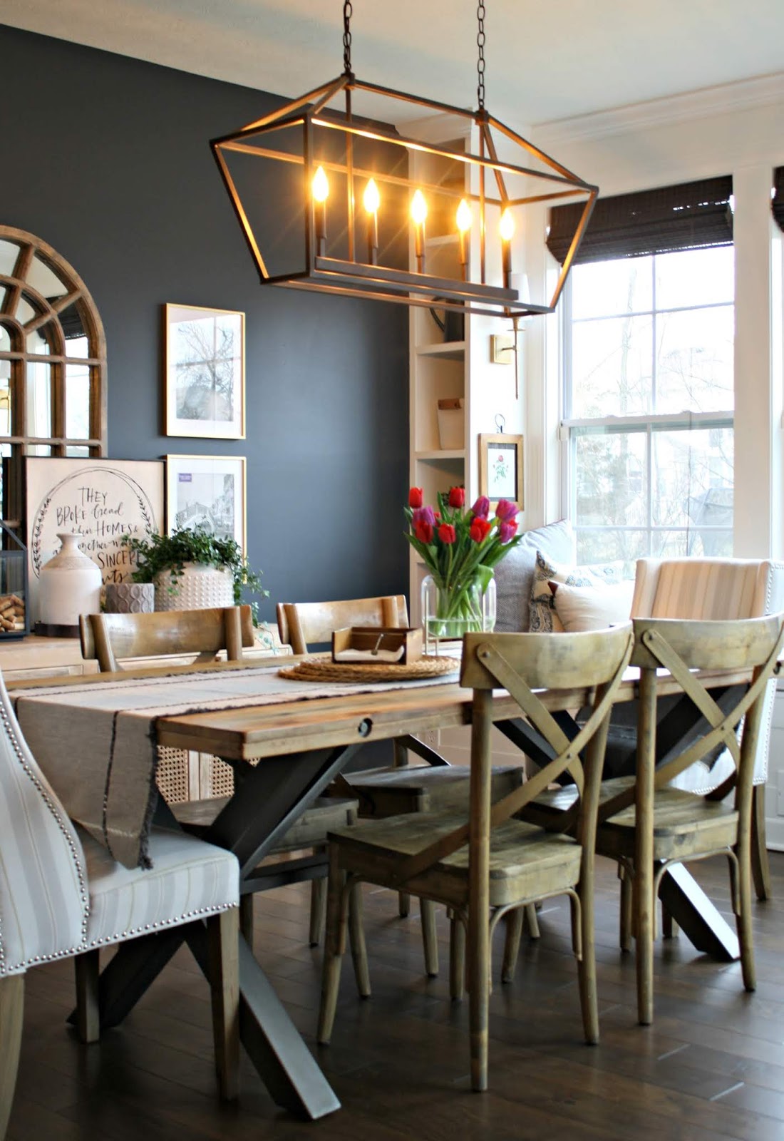 Dark blue accent wall in dining 
